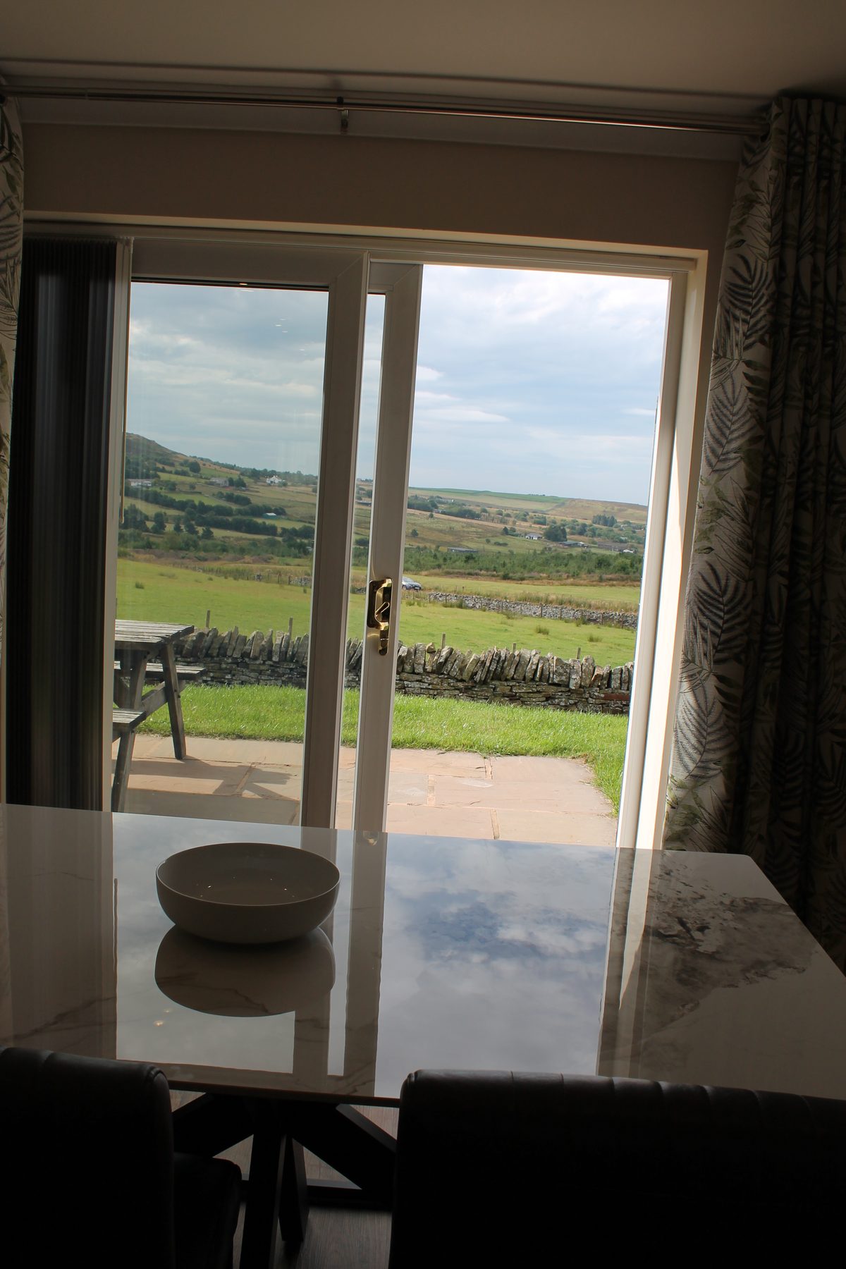 Patio and countryside views from dining